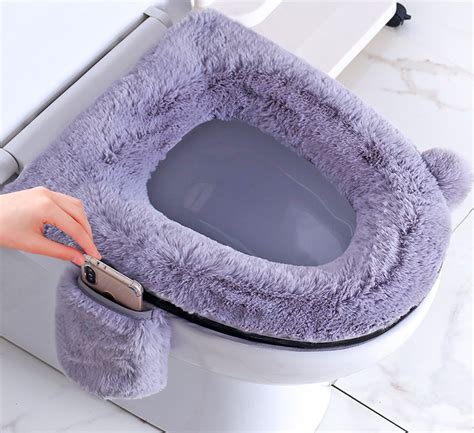 This Fluffy Toilet Seat Cover Comes Equipped With Its Own Phone Pocket