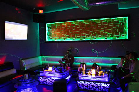 Karaoke bar offers piece of home for Asians, a new experience for ...