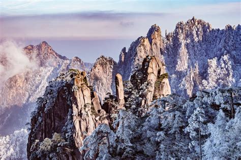 Cliffs in Huangshan National Park at Foggy Winter Evening Stock Image ...