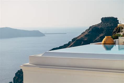 Infinity pool santorini - Greece Photograph by Daniel Pazmany - Pixels