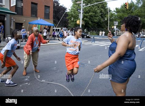 Practicing Double Dutch (jump rope) on the street in Brooklyn during ...