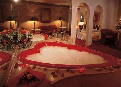 You could spend your Honeymoon in a 7-foot Champagne Glass Bath ... or Not.