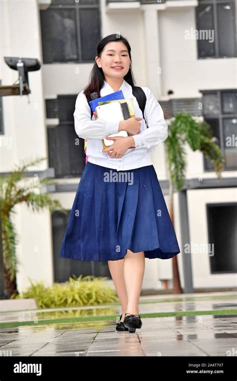 Smiling Young Chinese Girl Student Wearing School Uniform Walking On ...