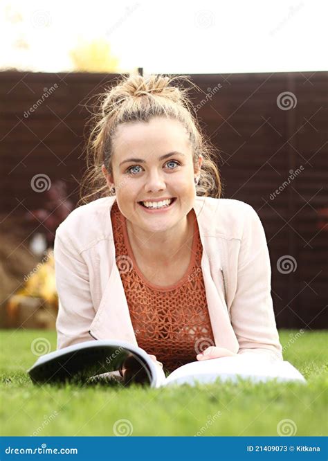 Reading a book outdoors stock image. Image of reading - 21409073