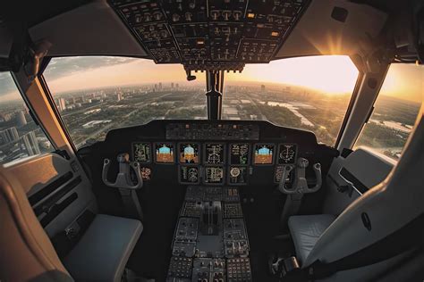 Cockpit of modern passenger jet aircraft. Pilots at work. Aerial view ...