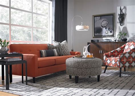 Orange couch grey walls | Burnt orange living room, Living room decor ...