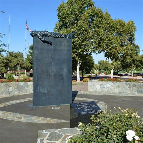 Veterans Memorial - Riverside Photograph by Glenn McCarthy Art and ...