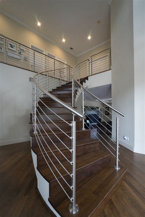 Curved Stainless Steel Rod Railings | Bella Stairs, LLC | Archinect