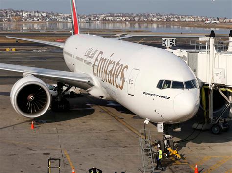 Emirates flight attendant dies after falling out of a Boeing 777 ...