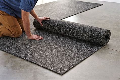 Rubber flooring installation for home and commercial gyms. | Rolled ...