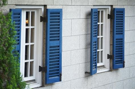 Premium Photo | Blue window shutters