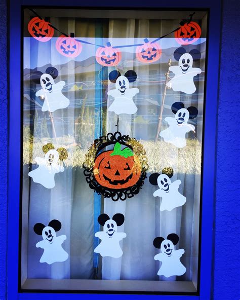 Our Halloween Disney Window Decorations | Disney halloween decorations ...