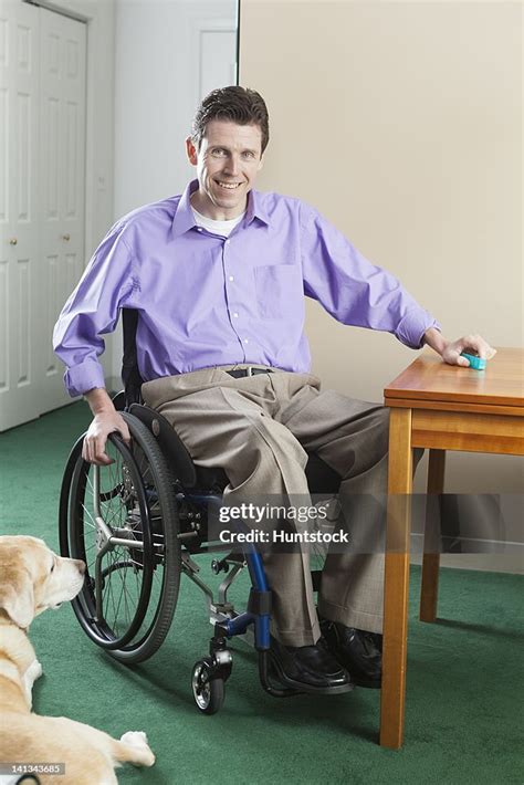 Quadriplegic Man In Wheelchair With Spinal Cord Injury Opening Pill ...