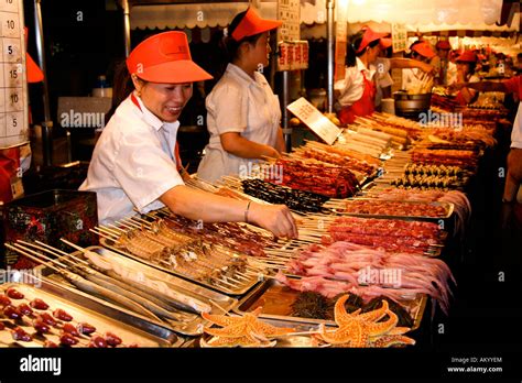 Night market in Donghuamen street after dark, Beijing, China Stock ...