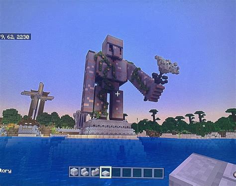 My attempt at an Iron golem statue. The arm and flower looks too big to ...