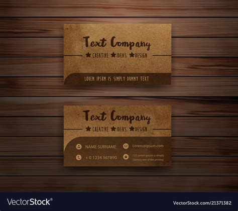 Recycled paper business cards on wooden background