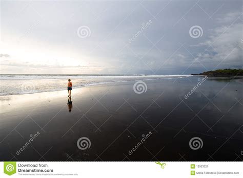 Sunset on the Black Sand Beach Stock Image - Image of outdoor, land ...