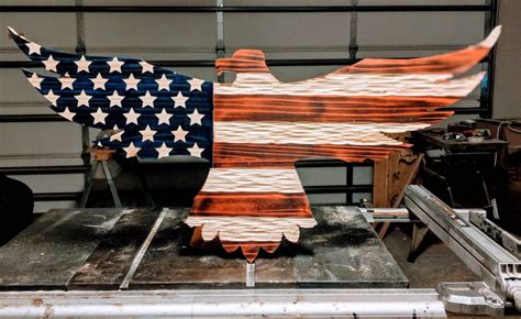 Carved wooden American flag eagle with unique chisel texture.