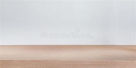 Wooden Table Top and White Wall Stock Image - Image of light, surface ...