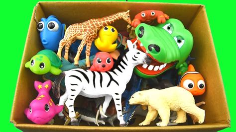 Learn Wild Animals in a Box and Shark Toys For Kids - YouTube