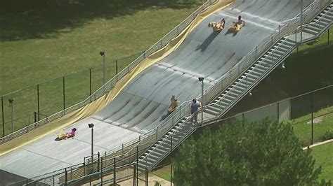 Watch: Riders go flying, bouncing down Belle Isle’s Giant Slide - YouTube