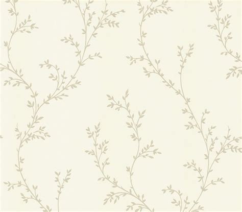 a white wallpaper with leaves and vines on the top of it's surface