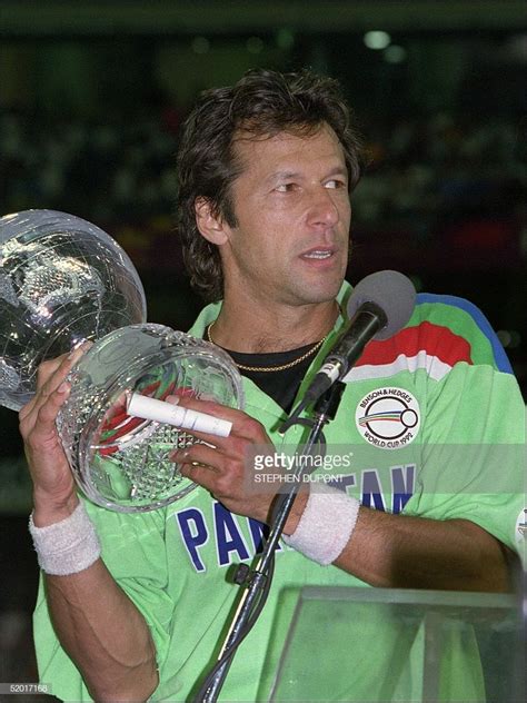 Pakistan's captain Imran Khan holds the 1992 World Cup Trophy during ...