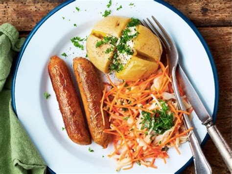 Lincolnshire sausages with coleslaw and baked potato - ProVeg International