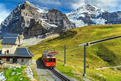 Eiger north face with red train containing adrenaline, alpine, and alps ...