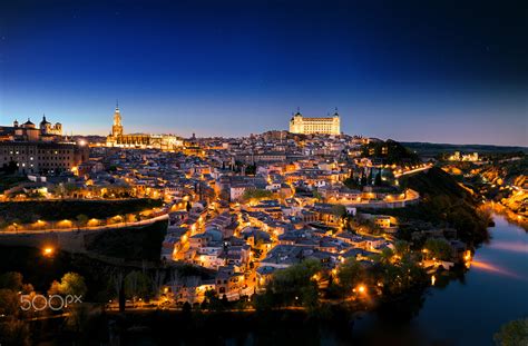 General view of Toledo in night time. Spain by Daniel Viñé Garcia ...