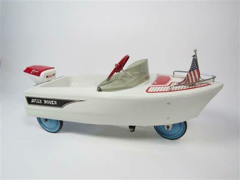 Outstanding 1950s-60s Murray Jolly Roger pedal car/boat with