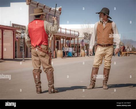 Period actors provide reireenactment of the shootout at the OK Corral ...