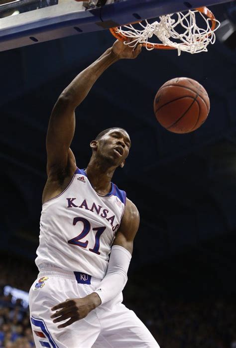 Kansas center Joel Embiid delivers on a dunk against Towson during the ...