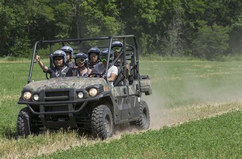 Kawasaki MULE PRO-FXT Camo with Six Riders (4) - ATVConnection.com