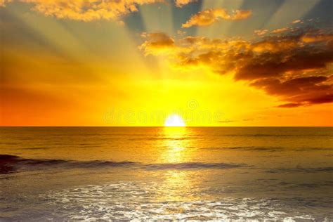 Majestic Bright Sunrise Over Ocean and Light Waves Stock Photo - Image ...