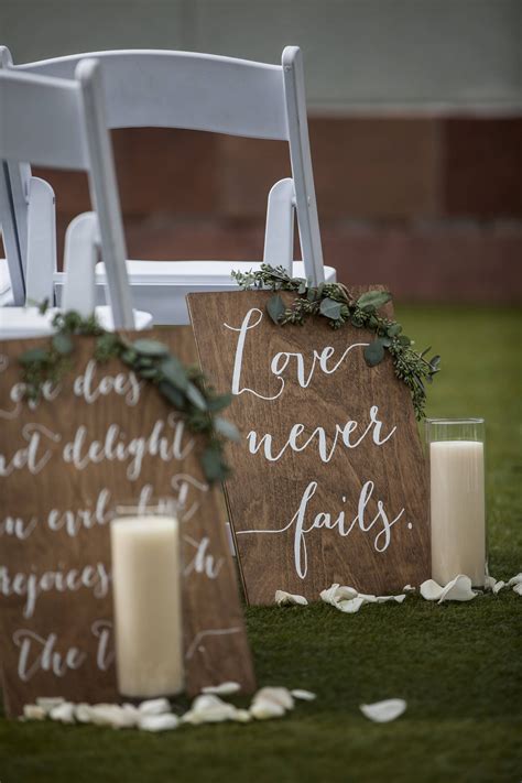 wedding ceremony aisle signs - Una Parrott