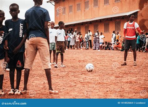 Black African Children, Boys and Adults Playing Soccer Editorial Stock ...