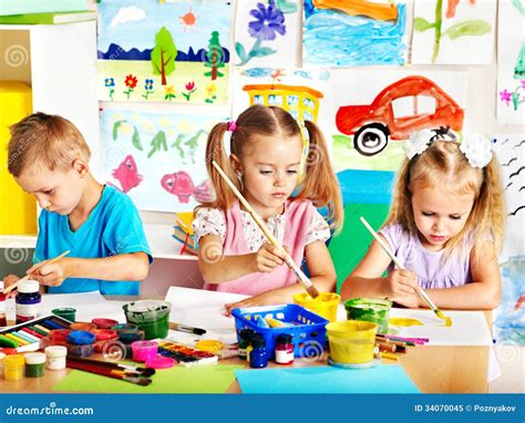 Child Painting In Preschool. Royalty-Free Stock Image | CartoonDealer ...