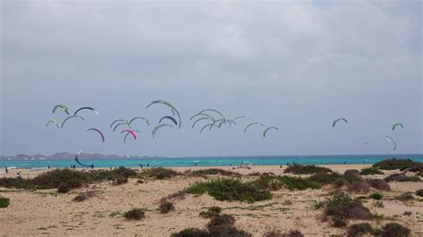 Lots of kites in the sky, kitesurfing competitions. 26236431 Stock ...