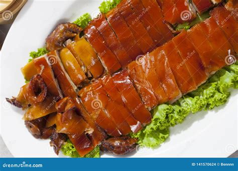 Golden Roasted BBQ Suckling Pig Cantonese Style. Stock Photo - Image of ...