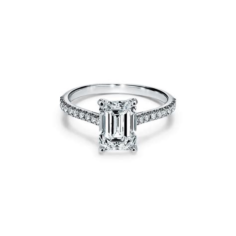 Tiffany Novo™ emerald-cut engagement ring with a pavé diamond band in ...