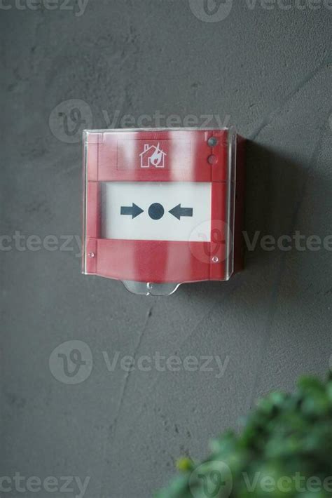 Red fire alarm button on wall , 24200363 Stock Photo at Vecteezy