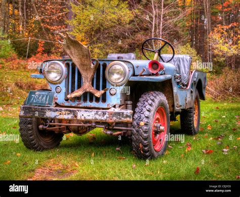 A vintage jeep awaits a task at a historic hunting and fishing camp on ...