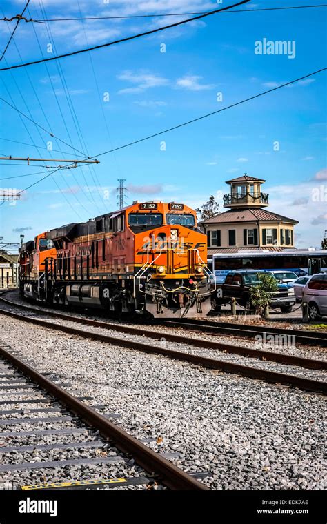 A Burlington North and Santa Fe (BNSF) C44-9W locomotive leads an oil ...