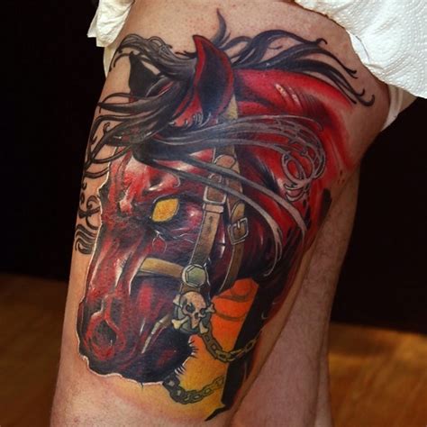 Colorful scary dark horse zombies tattoo on leg - Tattooimages.biz