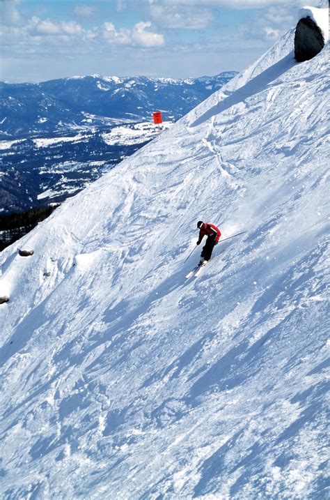 Yellowstone Club, Big Sky, Montana. Michael Reveal skis at the ...