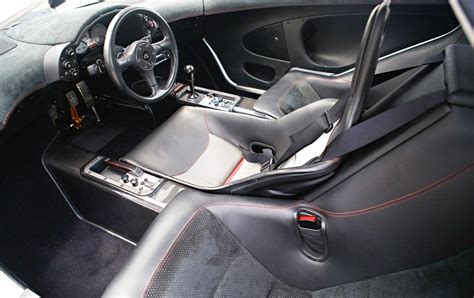 Mclaren f1 interior, the driver sits in the middle and there are two ...