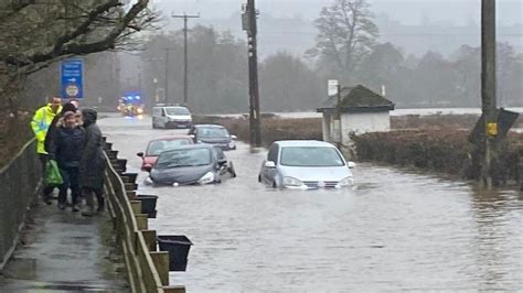 Heavy rain causes floods and travel chaos across UK - BBC News