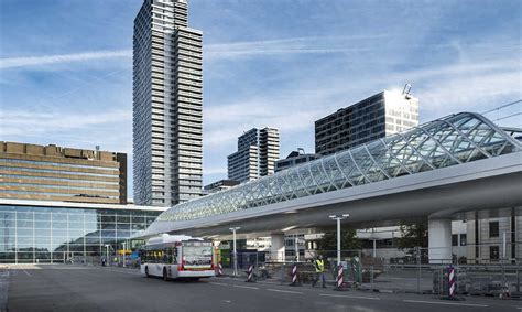 The Hague's elegant new light rail station masters curved glass and steel