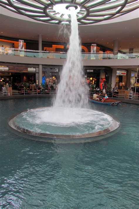 The fountain in the mall at the Marina Bay Sands in Singapore. A few ...